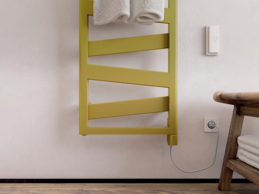 Zehnder Ribbon mit dem Heizstab IHD: Dieser macht die Technik am Heizkörper nahezu unsichtbar, hilft den Energieverbrauch beim Heizen gezielt zu reduzieren und erfüllt höchste Ansprüche an die farbliche Ästhetik im Badezimmer. Bilder: Zehnder